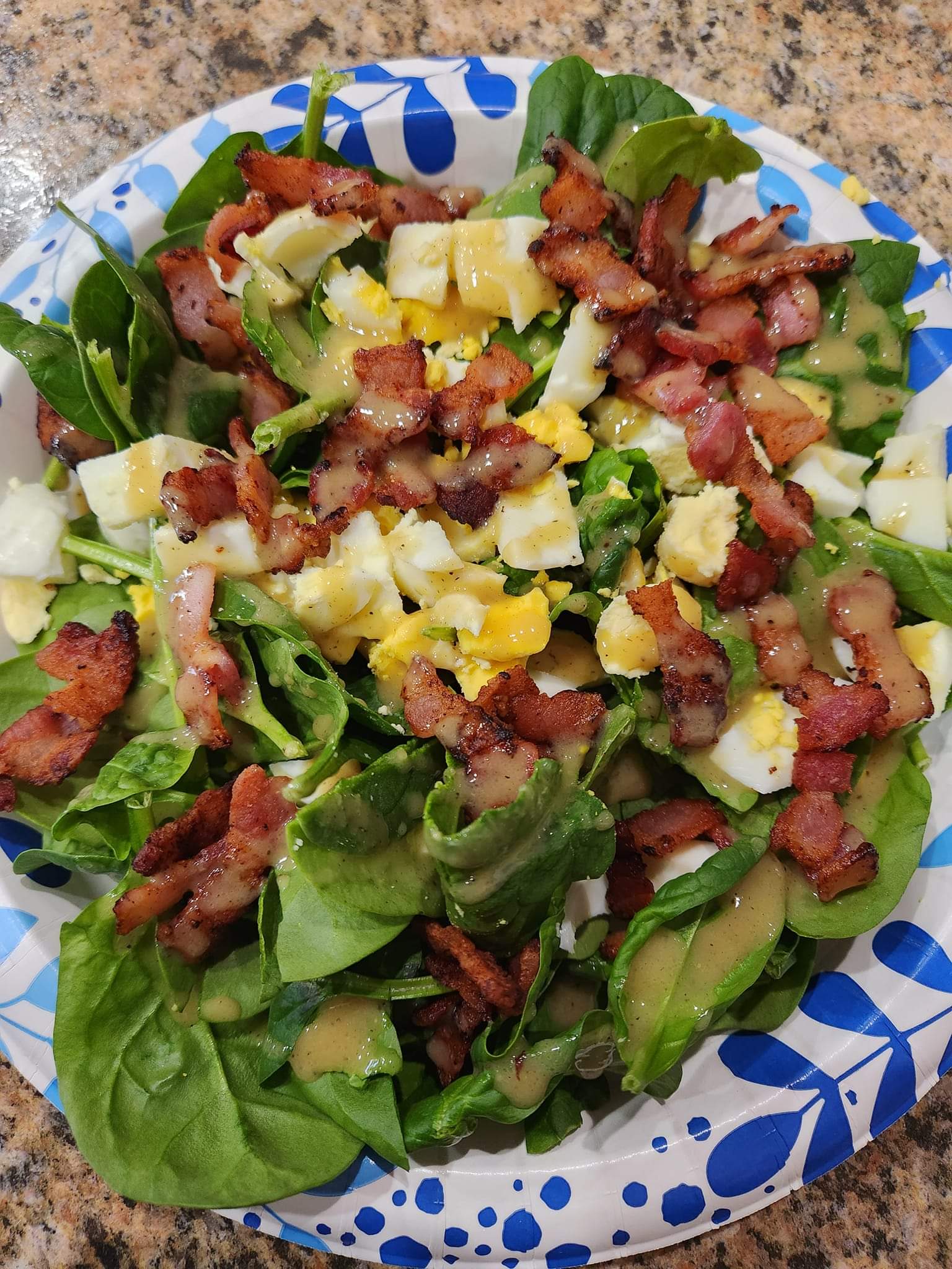 Spinach salad with warn bacon dressing.