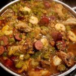 okra stew with chicken, sausage, shrimp and crawfish tails, onion and green peppers”