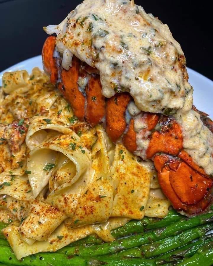 CAJUN LOBSTER, Crab and Salmon Alfredo