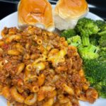 goulash , broccoli with Hawaiian rolls