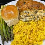 Collard Green Dip Stuffed Chicken Breast, Yellow Rice, Asparagus, and Hawaiian Roll