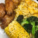 Honey Fried Chicken, Baked Mac and Cheese, Corn on the Cob, and Garlic Pepper Broccoli