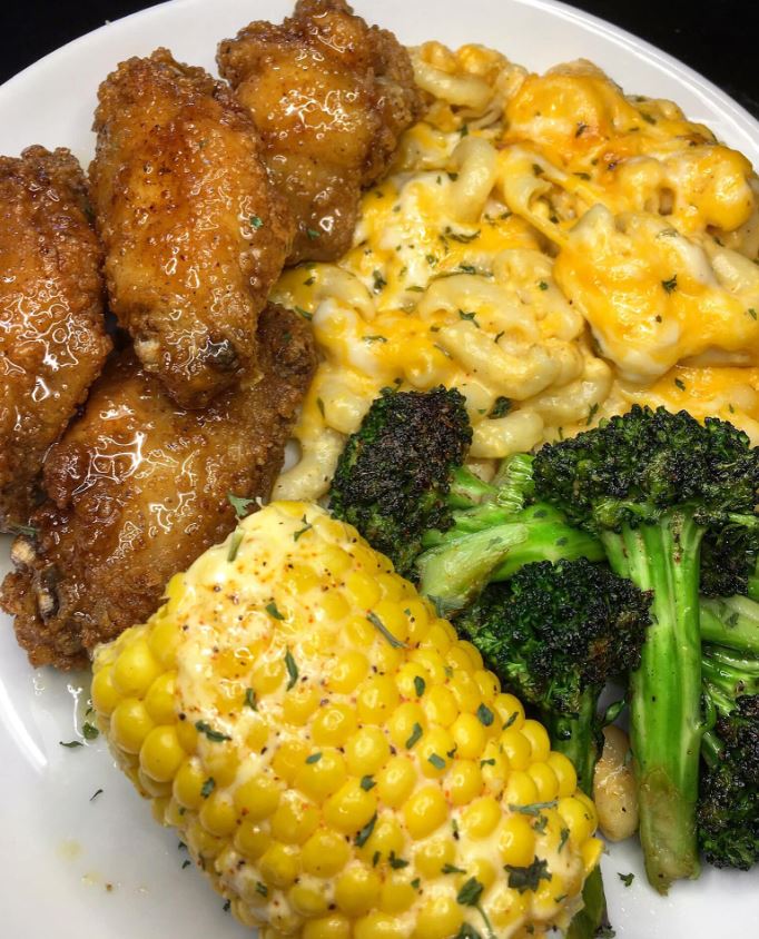 Honey Fried Chicken, Baked Mac and Cheese, Corn on the Cob, and Garlic Pepper Broccoli