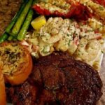 Shrimp pasta,grilled lobster with garlic butter, Ribeye seasoned simply