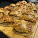 Air fryer sausage rolls filled with pork, stuffing and cranberry.